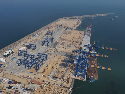 CWIT construction site with cranes and breakwater.