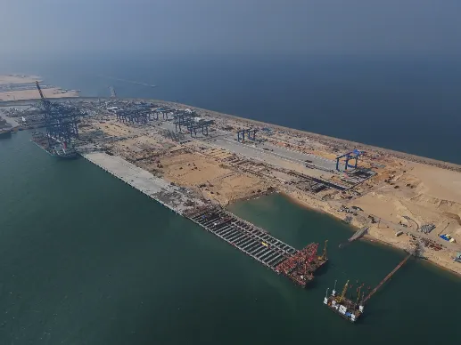 CWIT's construction site with breakwater and ships.