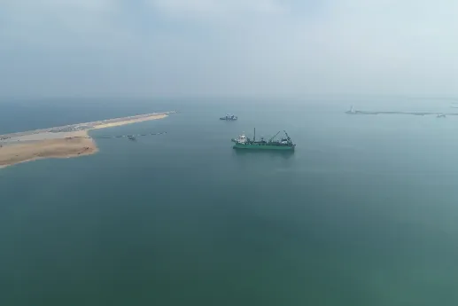 A work vessel in the ocean getting close to the CWIT berth.