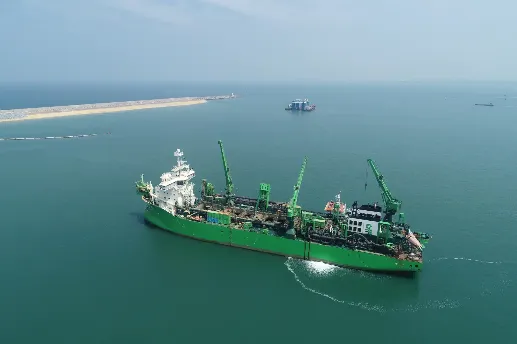 A work vessel getting close to dock at the CWIT berth.