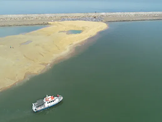 A boat near the breakwater of CWIT.