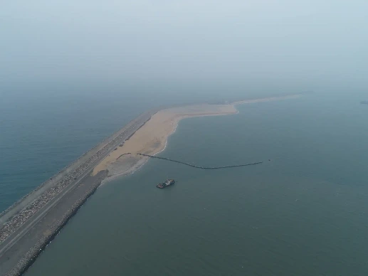 A birds eye view of a port with breakwater of CWIT.